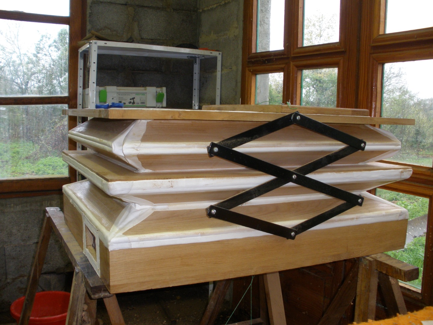 Construction d'un soufflet à plis compensés